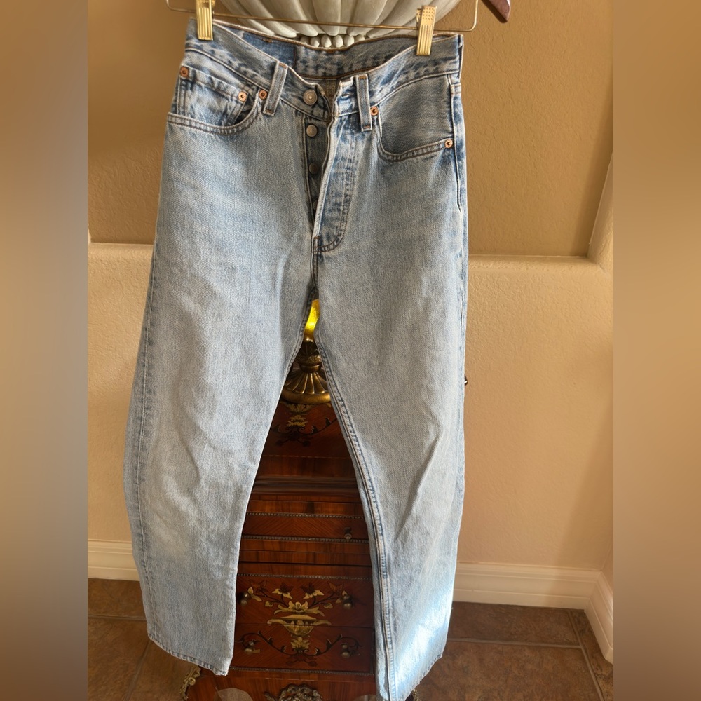 Vintage levis 501 size 26 altered to be 30 in length.